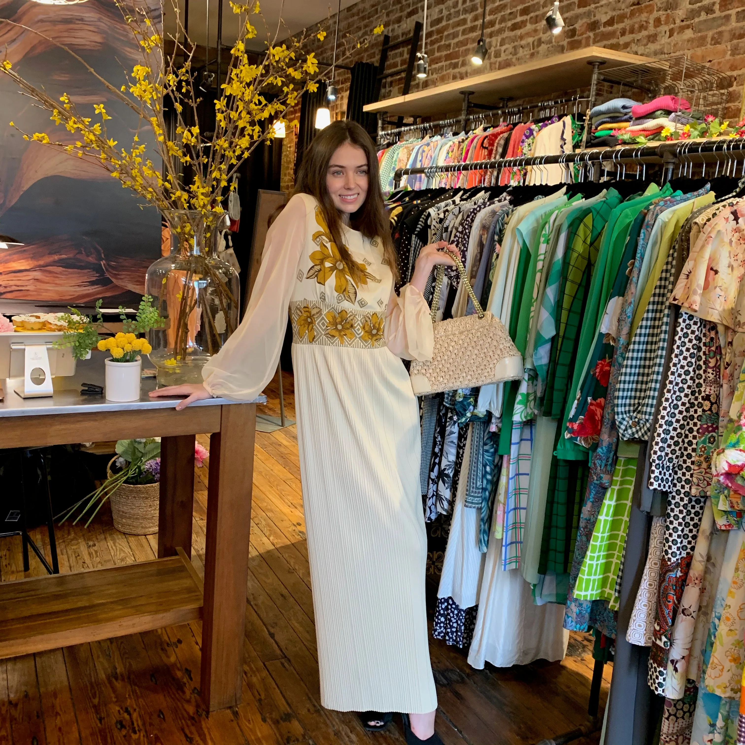 Knife pleated cream maxi with yellow flowers